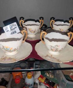 D&C double handled French Teacups and saucers