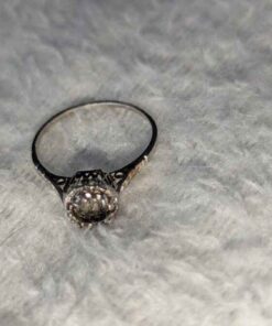 Ring Setting -no markings, testing at 22kt