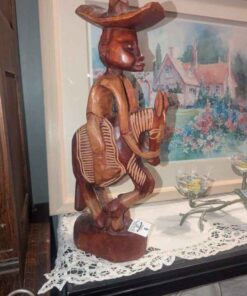Wood carved rider and donkey