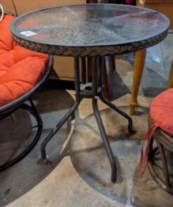 Glass top patio table