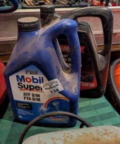 5 ltr bottles of transmission fluid and Hydraulic oil