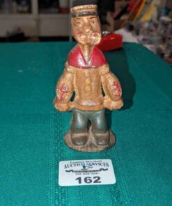 Cast iron Popeye the Sailor coin Bank