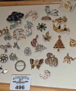 Brooches, lapel pins, etc
