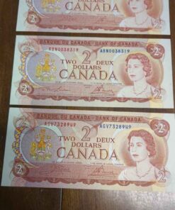 3 non-circulated 1974 Canada 2 dollar bills.