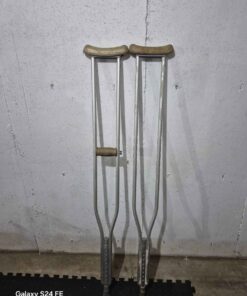 pair of crutches ... one crutch missing hand piece