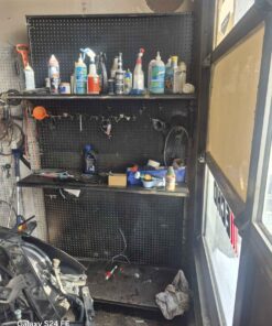 Wall unit with contents including amzoil, lucas tires sealer tire shine.You named