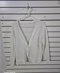 white sweater with buttons