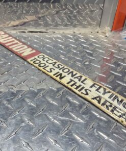 Caution occasional flying tools metal sign