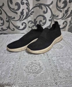 used pair of slip on shoes