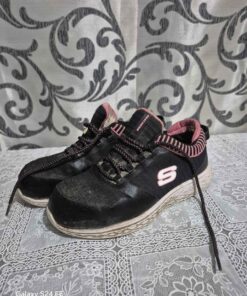 pair of used sketchers non-slip work shoes