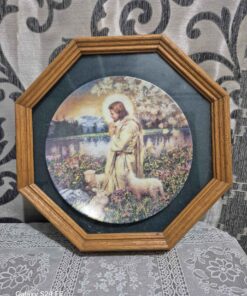 framed plate with Jesus sitting with sheep