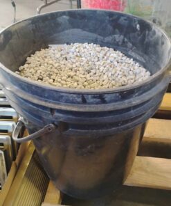 Pail full of aquarium gravel