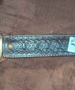 Impact knife with decorative sheath