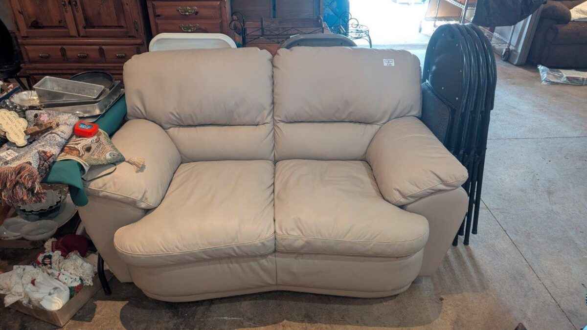 Taupe Leather loveseat