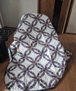 Queen size or larger floral circular quilt