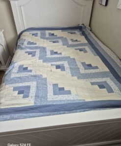 Queen sized or larger blue and white patchwork quilt