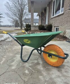 Green wheelbarrow with flat free tire