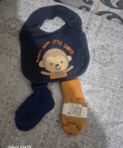 navy blue bib and 2 pairs of baby socks