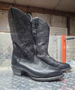 pair of black cowboy boots
