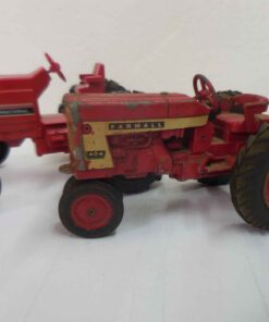 Farmall 404 1/16 scale (needs restoration) and International Tractor