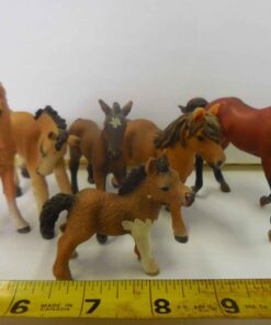 stable of foals with one yearling (resin figurines)