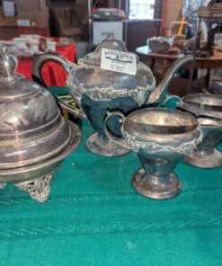 Plated tea pot, cream/sugar and covered serving dish