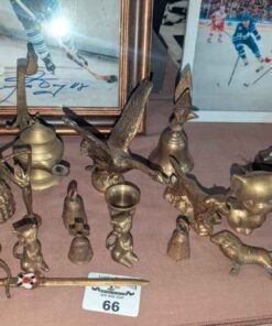 Brass bells, candle stick holders, statues, etc
