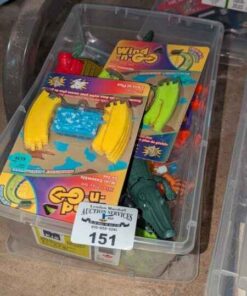 Variety of wind up toys, clear storage box