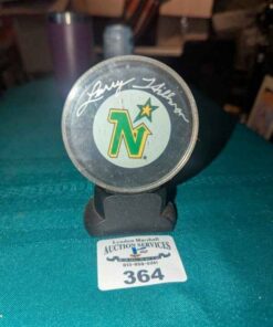 Larry Hillman North Star Autographed hockey puck