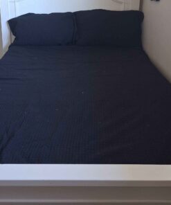 Queen or larger sized black sheet with matching pillow cases