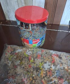 Cocoa cola puzzle with collector tin package is still sealed but has a small hole