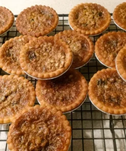 1/2 dozen Laura's delicious homemade pecan butter tarts
