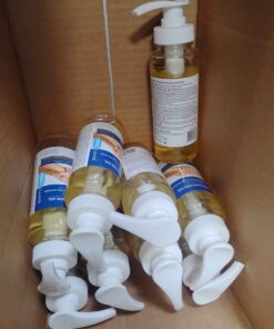 Partial case of partial bottles of sanitizer