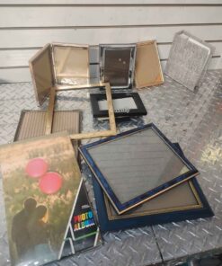 Assorted picture frames and photo albums