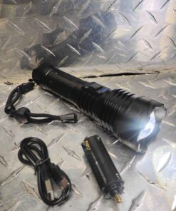 Adjustable focus spot/ flood rechargeable flashlight with extra battery compartment