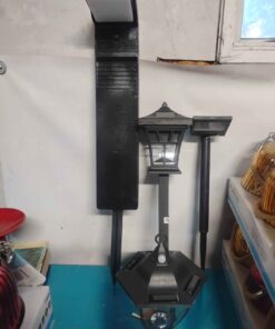 2 down shining lights 1 hanging light and 1 pathway light