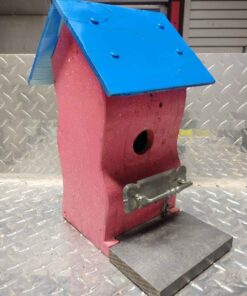 Beautiful birdhouse with hinged clean out door