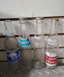 Qty 4 assorted Fanta ,old colony , quench and sunquest vintage bottles