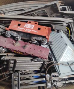 Large box of antique metal railway tracks and rail cars etc