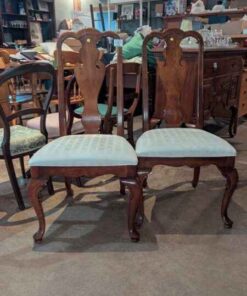 Antique bow legged wooden chairs with upholstered seats