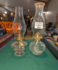 Pair of clear glass oil lamps