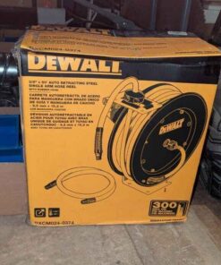 DeWalt 50ft auto retracting steel single arm hose reel and rubber hose- NEW