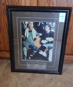 Framed wall hanging of Wayne Gretzky and Gordie Howie