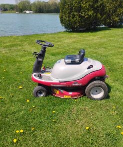 White outdoor power products rear engine riding lawnmower.... immaculate condition