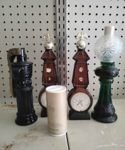 Avon perfume bottles some full some empty