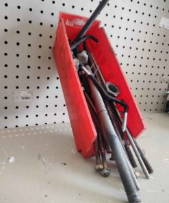 Red parts bin full of threaded rod nuts etc