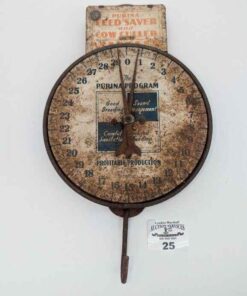 Purina Feed Saver and Cow Culler hanging advertising scale