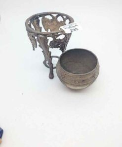 Brass vase and embossed cradle