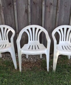 3 white plastic outdoor chairs