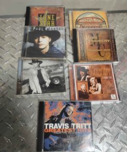7 assorted country music CDs